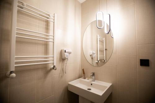 Salle de bains dans l'établissement Central Hotel Kutaisi