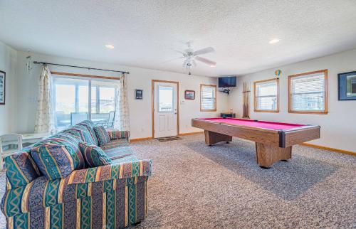 a living room with a pool table and a couch at Clear Skies - D0363 in Sanderling