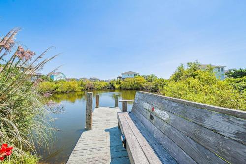 a wooden bridge over a body of water at Clear Skies - D0363 in Sanderling