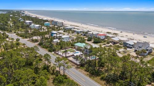an aerial view of the beach and condos at Stay Salty by Coastline Vacation Rentals in Cape San Blas