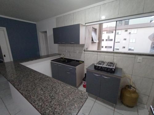 Dapur atau dapur kecil di Hotel Pousada Roma