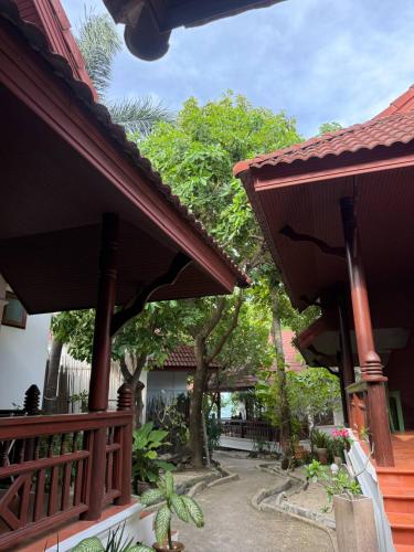 Un jardín fuera de Bhundhari Chaweng Beach Resort Koh Samui - SHA Plus