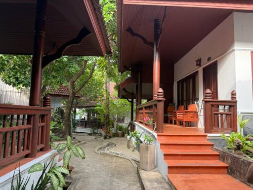 Un jardín fuera de Bhundhari Chaweng Beach Resort Koh Samui - SHA Plus