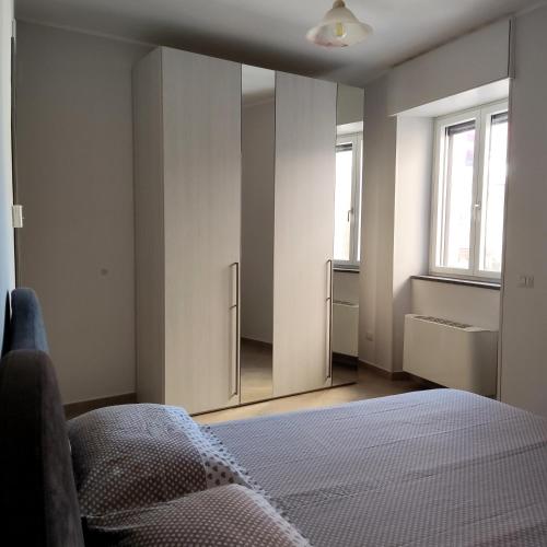 Postel nebo postele na pokoji v ubytování Casa Campanile Giungano