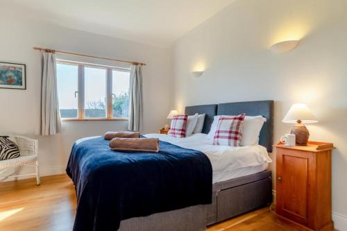 Ένα ή περισσότερα κρεβάτια σε δωμάτιο στο 3 Bed in South Cove oc-r30975