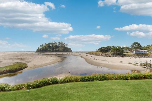 a view of a beach with a body of water at Neskowin Resort Unit #203 in Neskowin