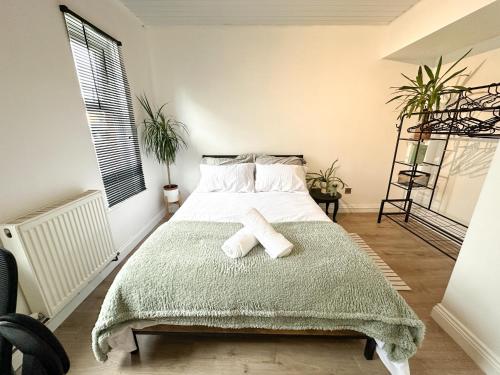 Ένα ή περισσότερα κρεβάτια σε δωμάτιο στο Spacious Single Room