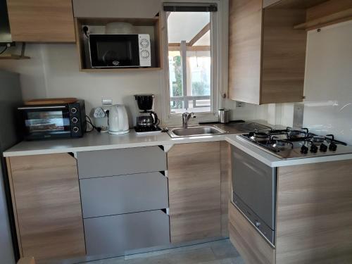 Η κουζίνα ή μικρή κουζίνα στο l'EPERVIER