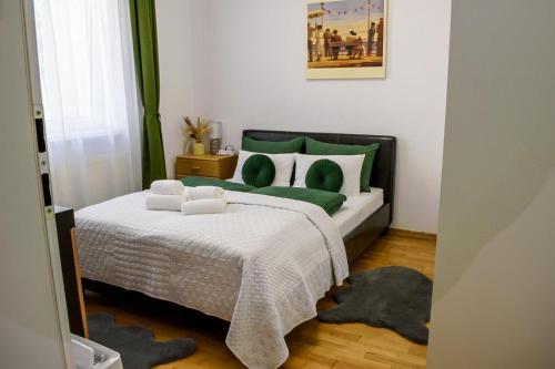 Ένα ή περισσότερα κρεβάτια σε δωμάτιο στο Apartment Sofya's Home