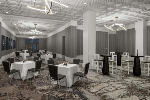 a rendering of a banquet hall with tables and chairs at Renaissance Chicago North Shore Hotel in Northbrook