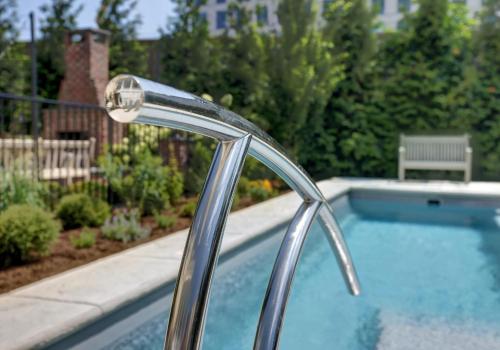 a close up of a faucet of a swimming pool at The 200 South St - King Rm 21 in Charlottesville