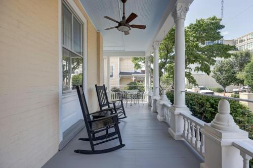 a porch with rocking chairs and a ceiling fan at The 200 South St - King Rm 3 in Charlottesville