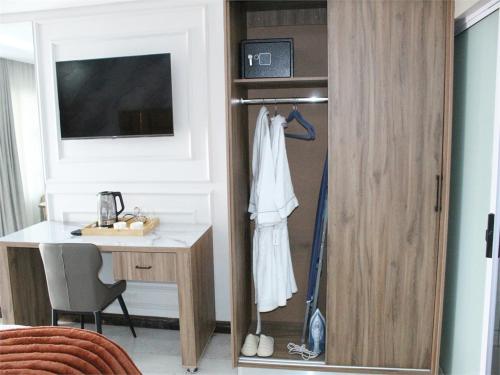 Televisyen dan/atau pusat hiburan di Minnesota Guest House