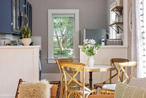 a dining room with a table and chairs at Harvest Moon in Atlanta