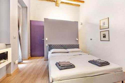 Postel nebo postele na pokoji v ubytování Appartamento il Borgo