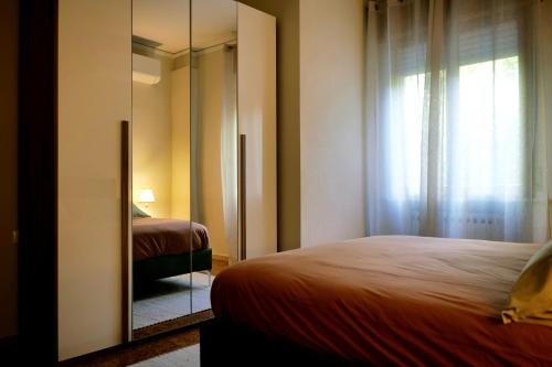 Postel nebo postele na pokoji v ubytování B&B Villa Sassuolo by EUROMODENA