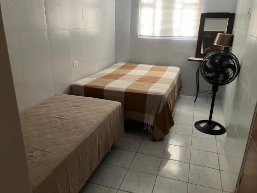 Ένα ή περισσότερα κρεβάτια σε δωμάτιο στο Casa grande em Bonito-PE