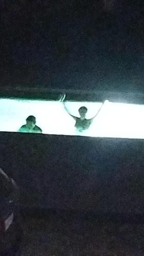 two people standing in a bath tub at night at Casa en la playa-campo in La Ligua