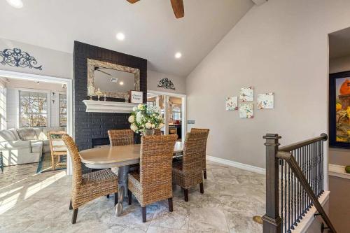 a dining room with a table and chairs at Gilead Grand Lake Family Retreat in Grove