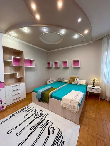 Llit o llits en una habitació de Rent Jordan