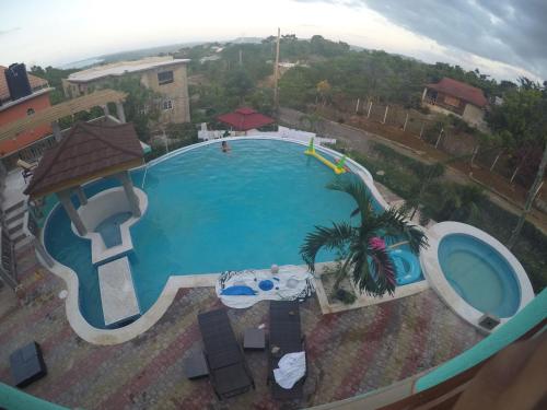 an overhead view of a large swimming pool at Negril Sky Blue Resorts LTD in Negril