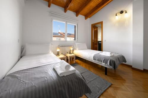 Postel nebo postele na pokoji v ubytování Magnifica casa en Torrejón del Rey