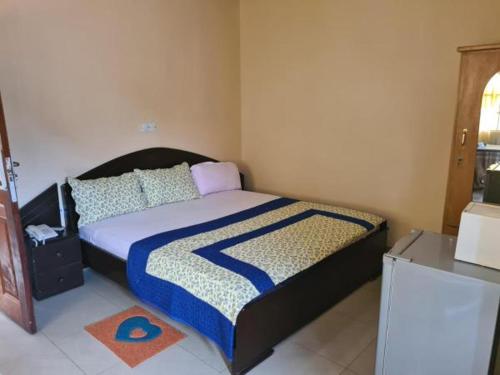 Ένα ή περισσότερα κρεβάτια σε δωμάτιο στο Crystal Rock Hotel