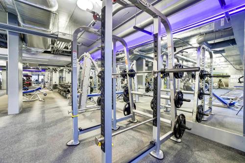 a gym with a bunch of bikes in it at Stylish Apartment Close to National Landing in Arlington