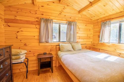 Postel nebo postele na pokoji v ubytování Wilderness Presidential Resort