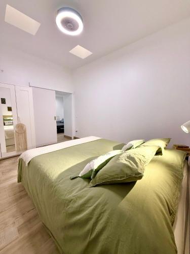 Ένα ή περισσότερα κρεβάτια σε δωμάτιο στο Apartamentos Juvimar