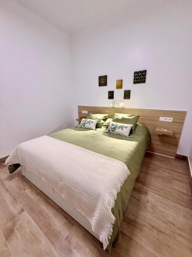 Ένα ή περισσότερα κρεβάτια σε δωμάτιο στο Apartamentos Juvimar