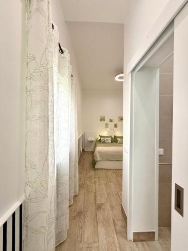 Ένα ή περισσότερα κρεβάτια σε δωμάτιο στο Apartamentos Juvimar