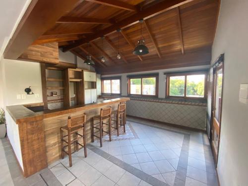 Η κουζίνα ή μικρή κουζίνα στο Cobertura Moinhos de Vento