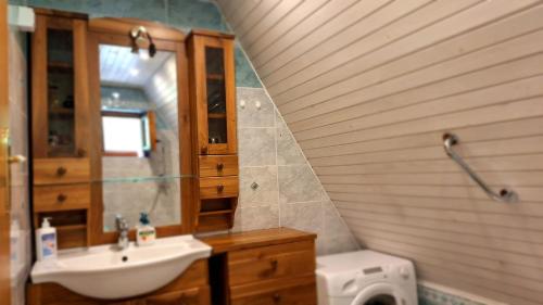 a bathroom with a sink and a toilet at Apartma Jurjovka in Nazarje
