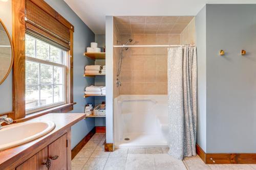 a bathroom with a shower and a sink at Walk to River Couples Retreat in Kintnersville! in Kintnersville