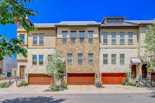 a large brick house with a garage at Bend in the River in Georgetown