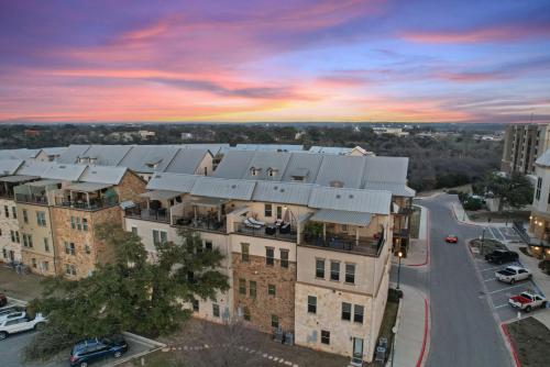 an aerial view of an apartment building with a street at Bend in the River in Georgetown