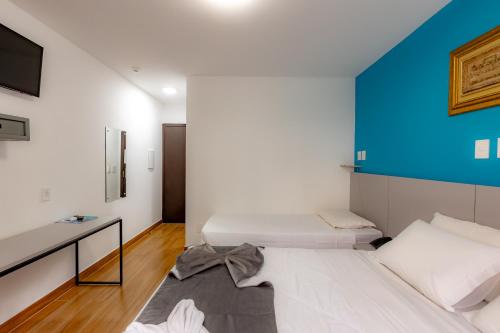 Postel nebo postele na pokoji v ubytování Mar Hotel