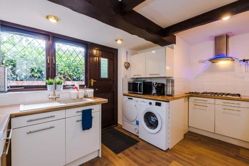 Η κουζίνα ή μικρή κουζίνα στο 4bed 3bath prv-parking x3 doubles x1 king
