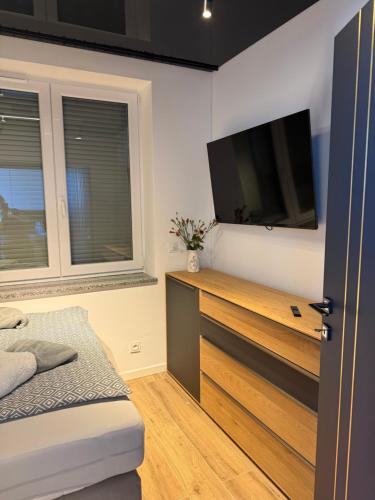 TV a/nebo společenská místnost v ubytování Sapore Dream STUDIO 2
