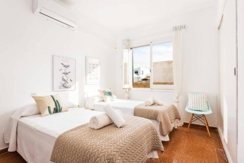 En eller flere senge i et værelse på Villa Antonita by Villa Plus