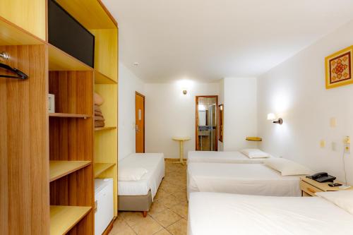Postel nebo postele na pokoji v ubytování Mar Hotel