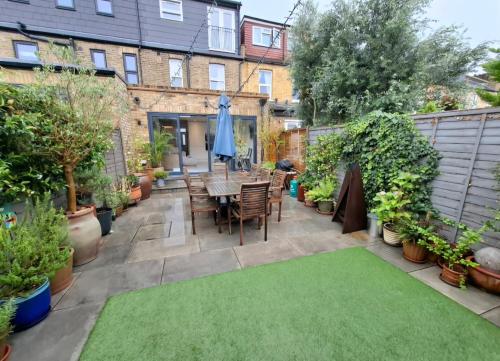 Κήπος έξω από το Elegant Garden Flat - Wimbledon