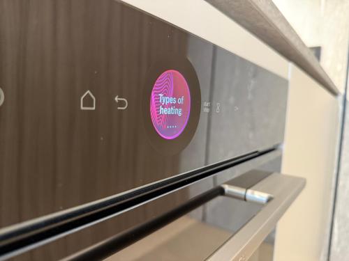 a sticker on the front of an oven at Space Row Exclusive Residences in Heraklio Town