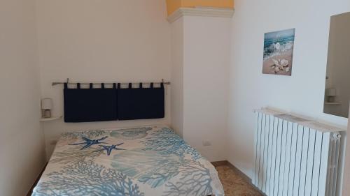 Una cama o camas en una habitación de STANZA UNO G. G CONTE