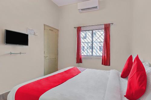Hotel O Shree Balaji Lodgingにあるベッド