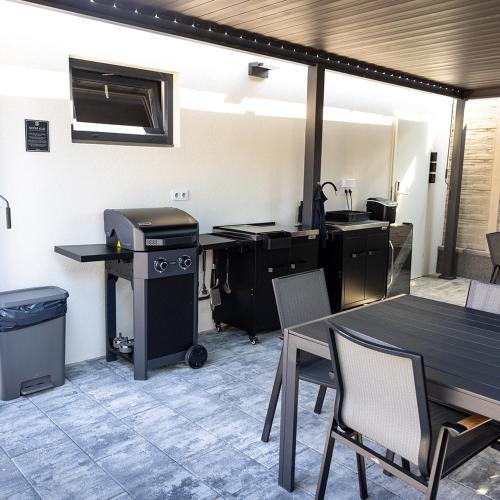 Η κουζίνα ή μικρή κουζίνα στο KAR-LA apartments