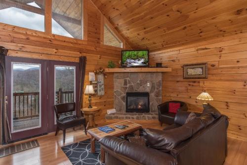 Televisyen dan/atau pusat hiburan di Precious View by American Patriot Getaways