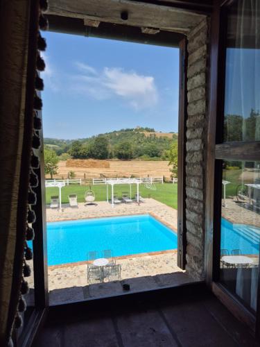 Bazén v ubytování Agriturismo Case Corboli appartamento Utimio nebo v jeho okolí