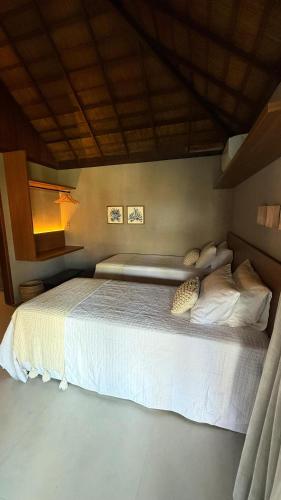 Katil atau katil-katil dalam bilik di Pousada Duna Paraiso Maceió